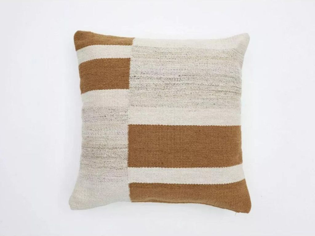 brown and white and gray square pillow