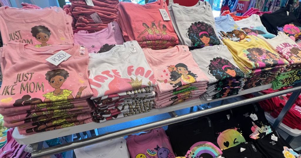 girls graphic tees on display in store