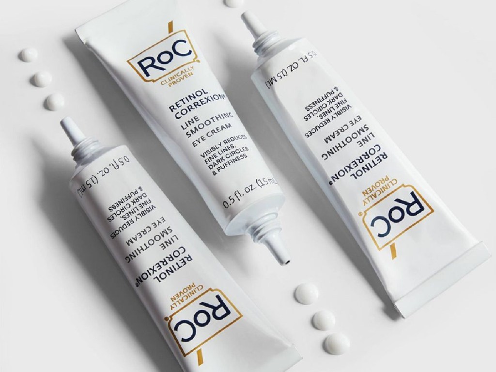 three tubes of ROC under eye cream with 3 drops coming from ach