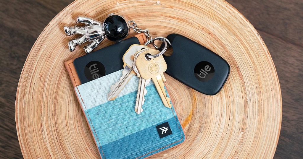 tile wallet and keychain with keys on table