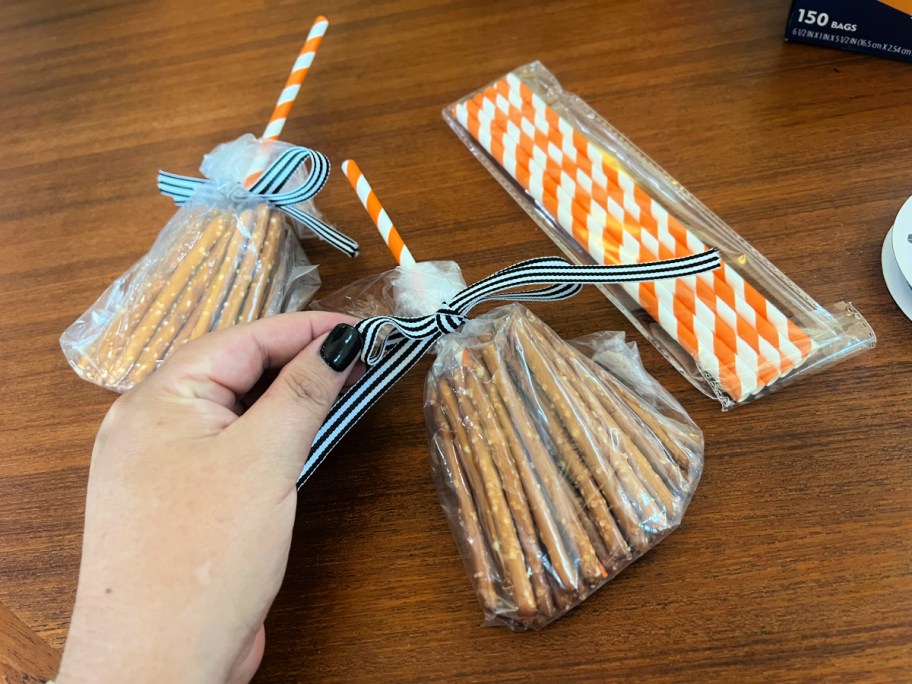 tying a bow on a pretzel treat