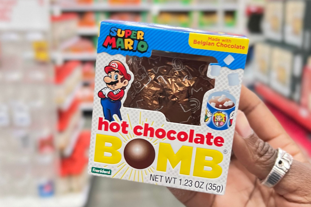 Hand holding Super Mario Brothers Hot Chocolate Bomb in Target