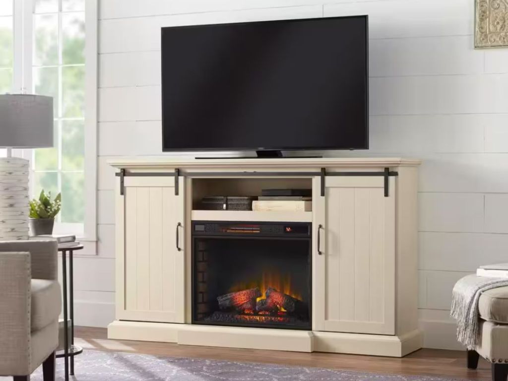 ivory color electric fireplace TV stand in living room