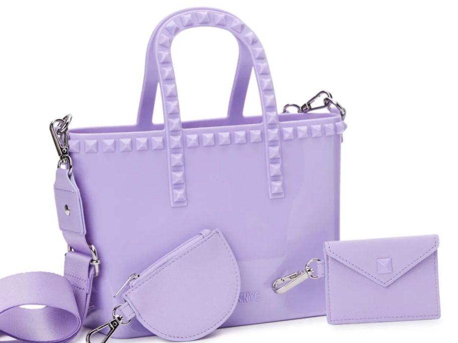 light purple women's jelly tote bag with handles and strap and cosmetic bags