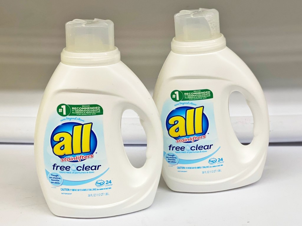 two white bottles of All Free Clear Liquid Laundry Detergent