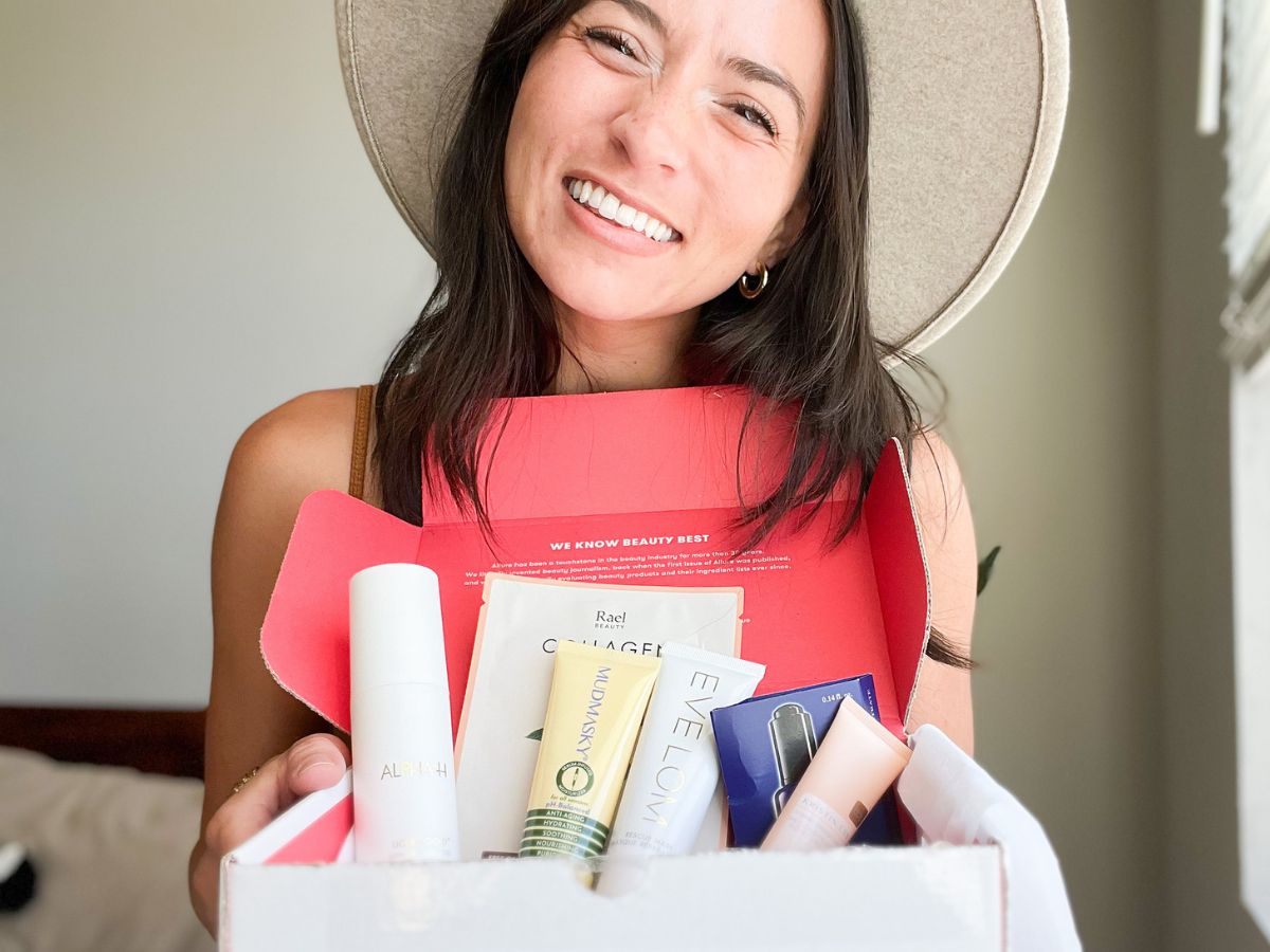 Woman holding the Allure Beauty Box for September 2023