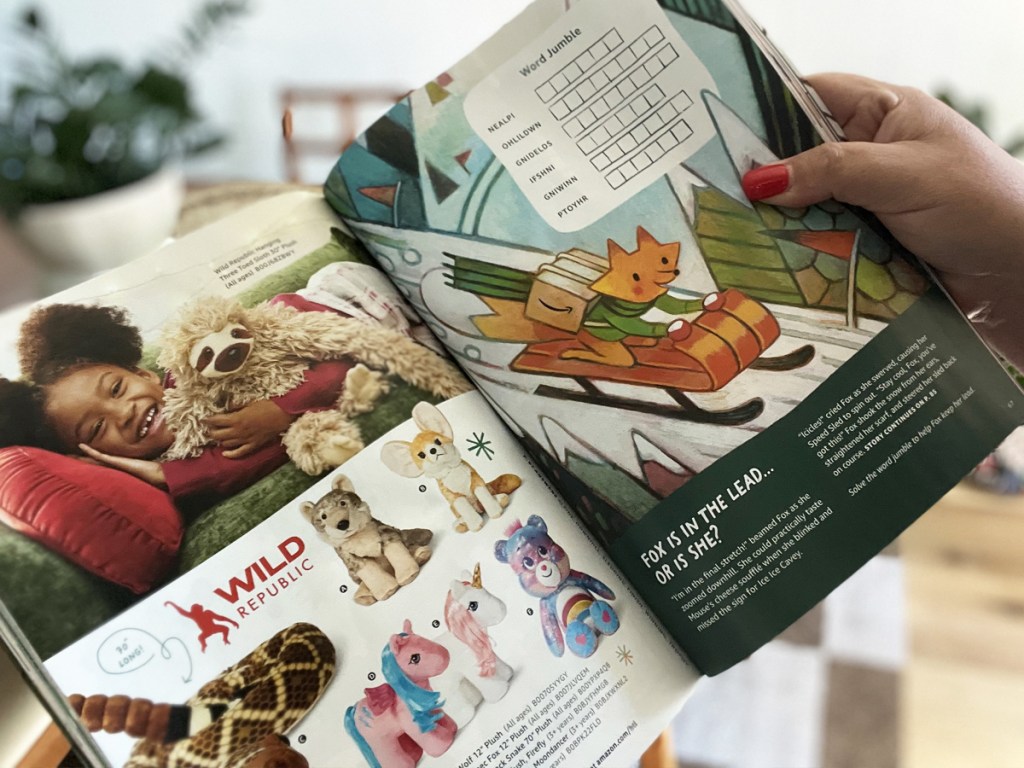 flipping through pages of Amazon Holiday Toy Catalog Book