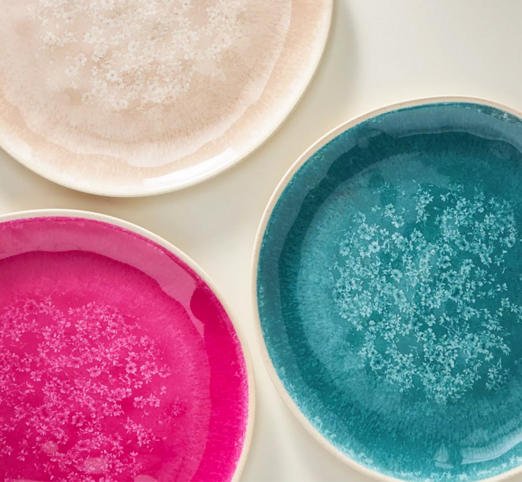 white, blue, and pink dessert plates