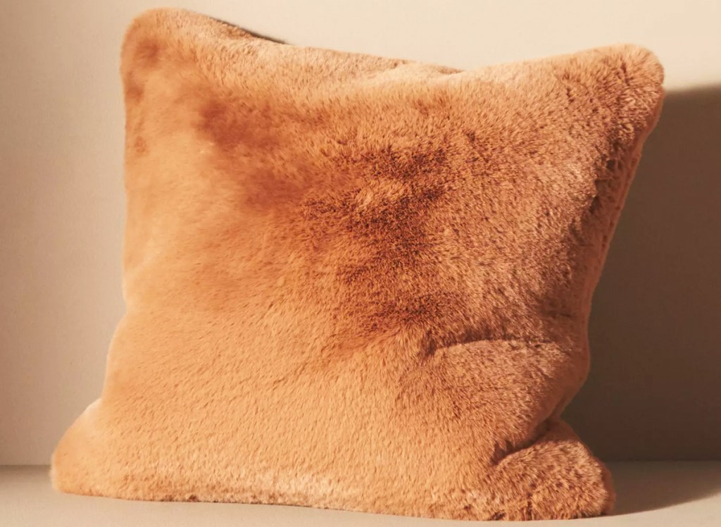 brown fur throw pillow