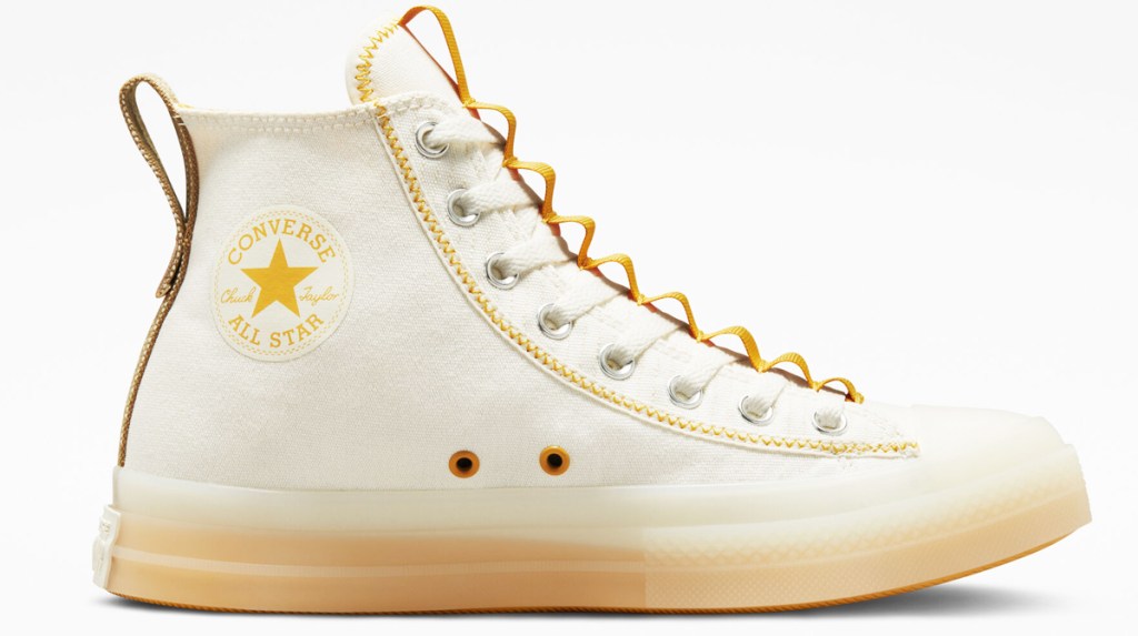white and yellow converse high top shoe