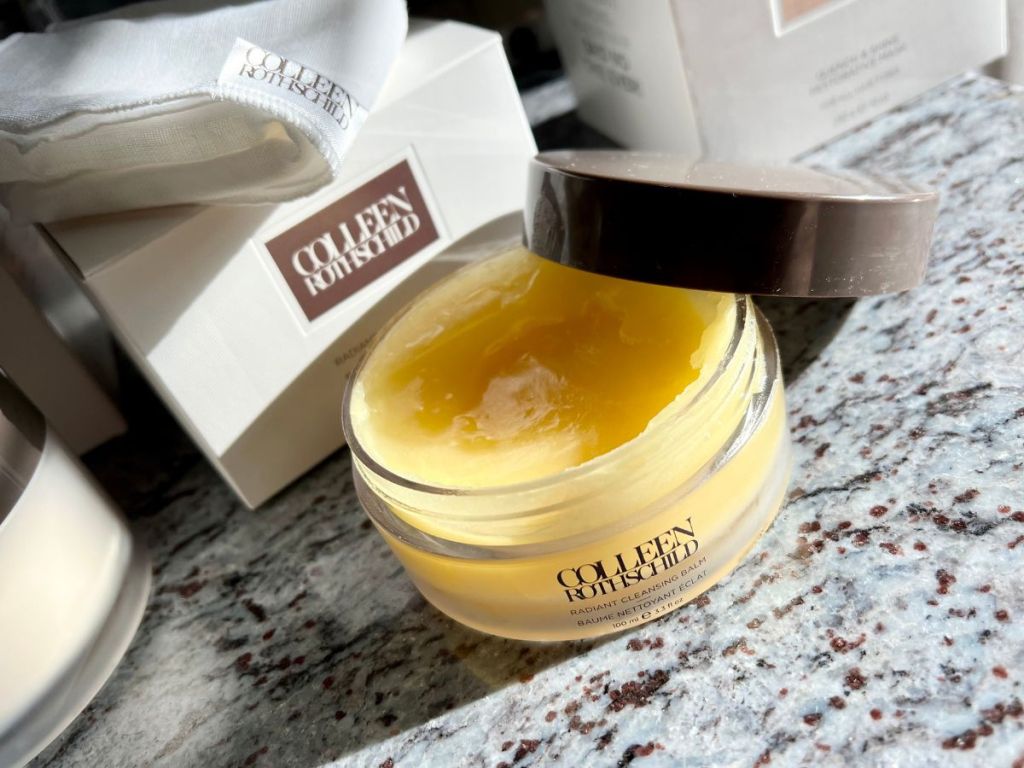 An open jar of Colleen Rothschild Radiant Cleansing Balm