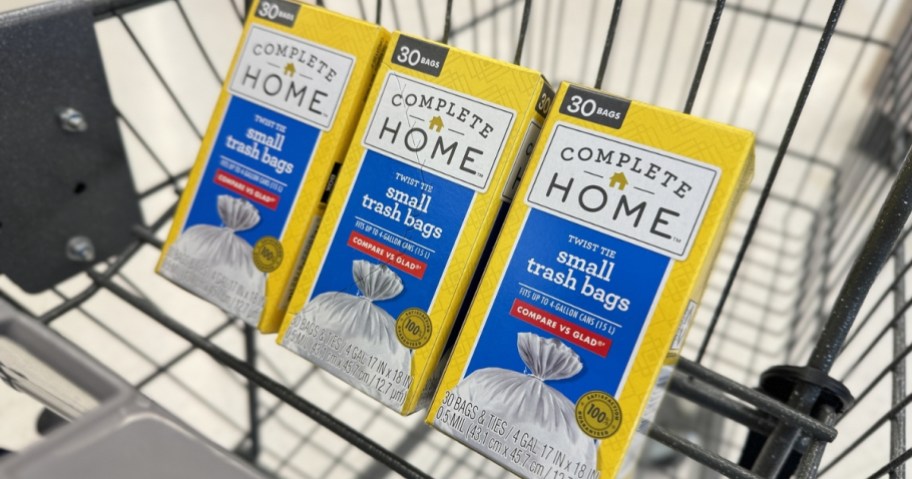 3 boxes of complete home trash bags in walgreens cart