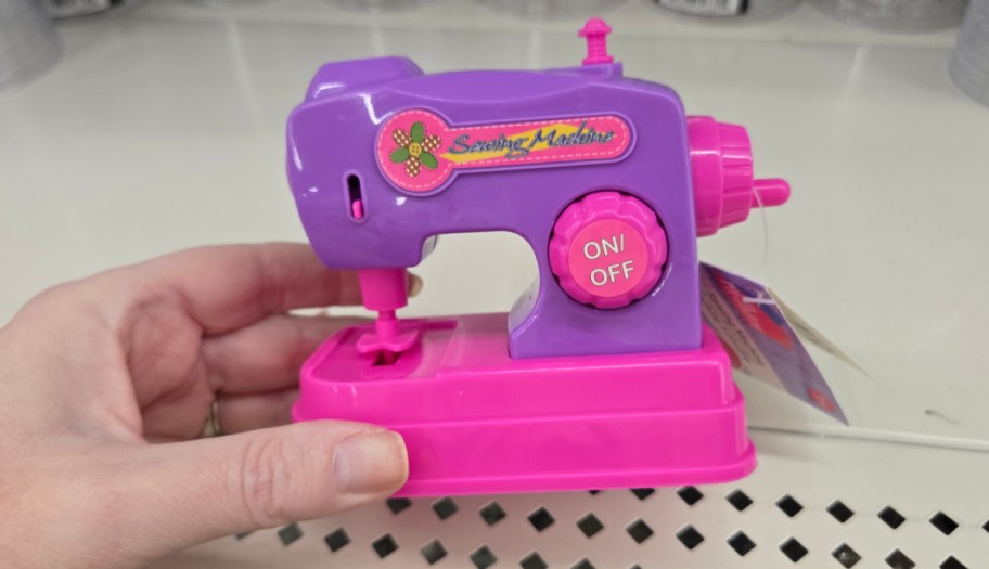 A plastic sewing machine from dollar tree that can be used as one of your barbie accessories