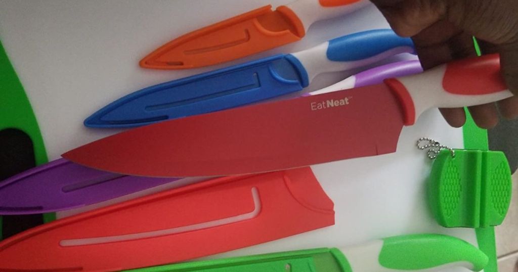 Eat Neat Colorful Knife Set on a cutting board