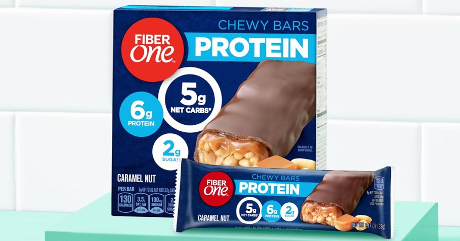 box of Fiber One Chewy Protein Bars with bar in front of it