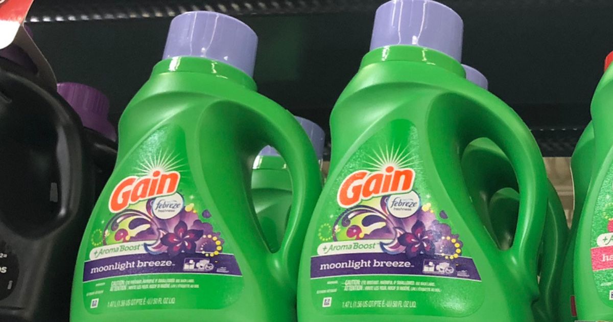 Bottles of Gain Moonlight Breeze Laundry detergent on a store shelf