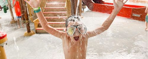 Boy at an indoor water park