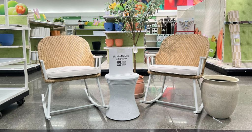set of patio rocker furniture with side table and large planter on display at Target