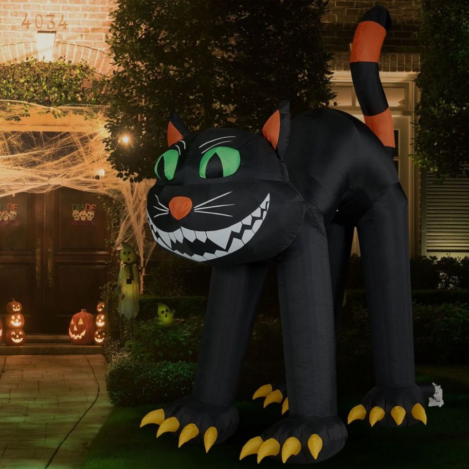 a large arched back black cat halloween inflatable