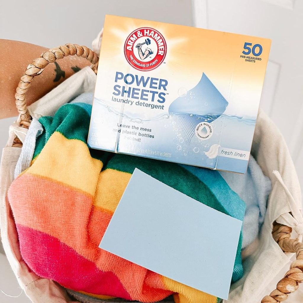 Arm & Hammer Power Sheets Laundry Detergent, Fresh Linen 50ct on basket of laundry