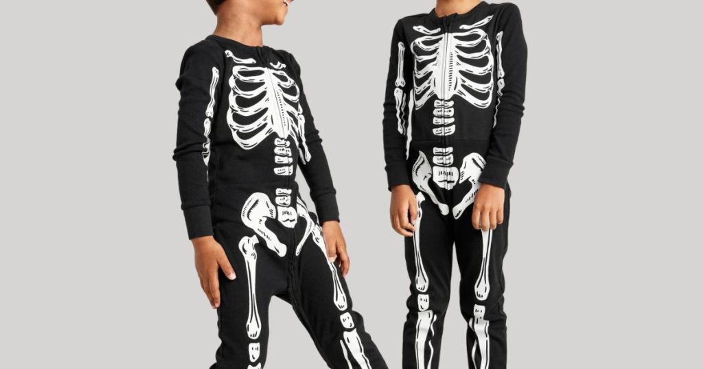 kids wearing Old Navy Baby and Toddler Halloween Skeleton Pajamas