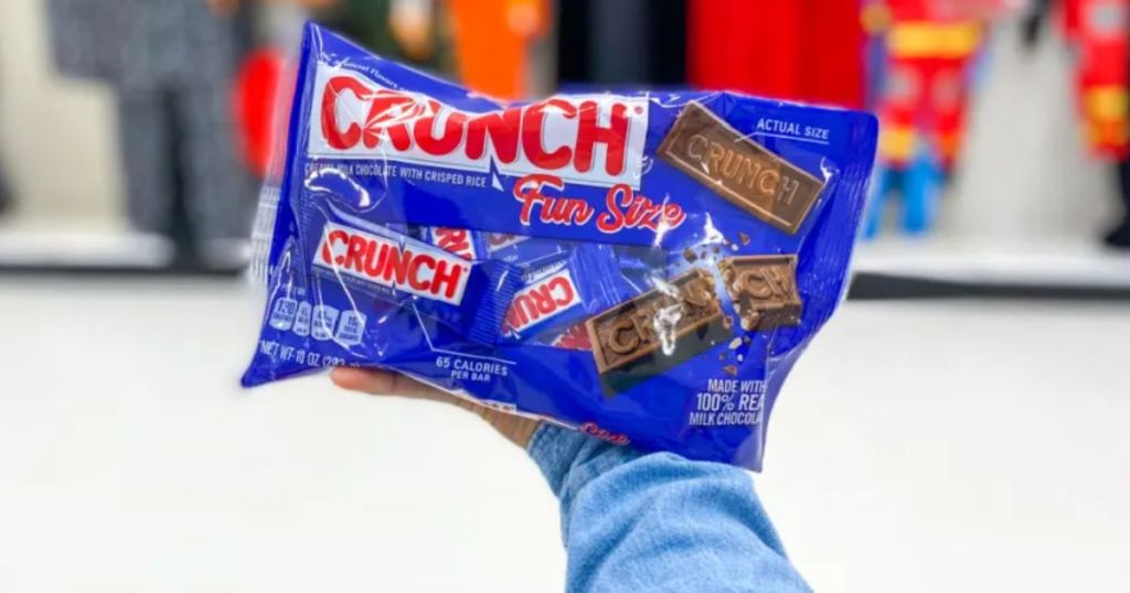 Nestle Crunch Bars Fun Size bag in woman's hand