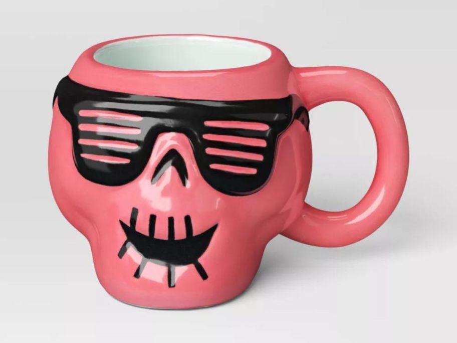 Hyde & EEK! Boutique 14.8oz Halloween Earthenware Figural Pink Skull Mug stock image