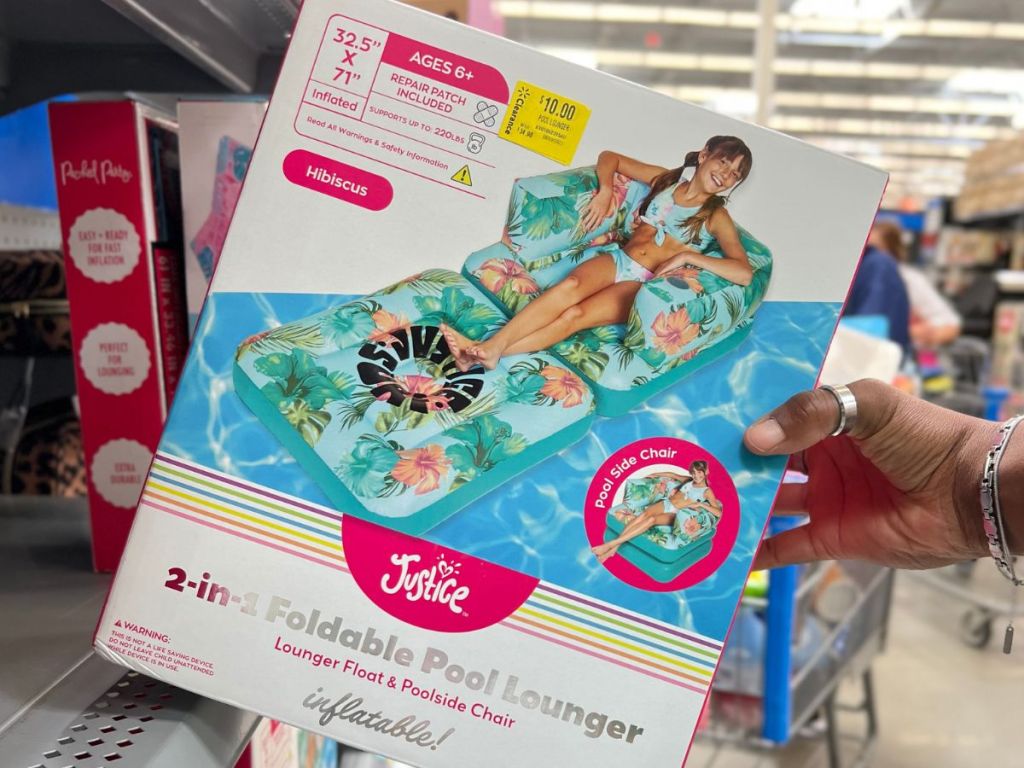 A picture on a box of a girl on a pool lounger 