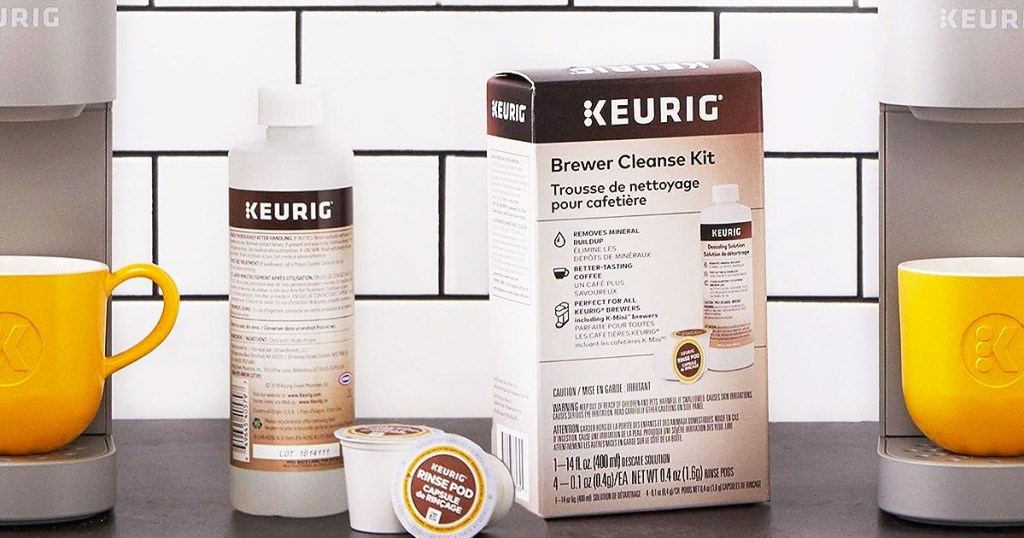 Keurig Brewer Cleanse Kit on kitchne counter next to Keurig machine