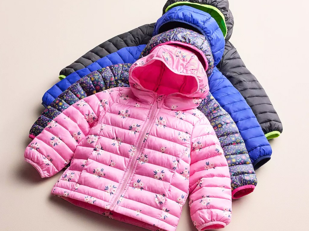 toddler puffer jackets stacked on one another