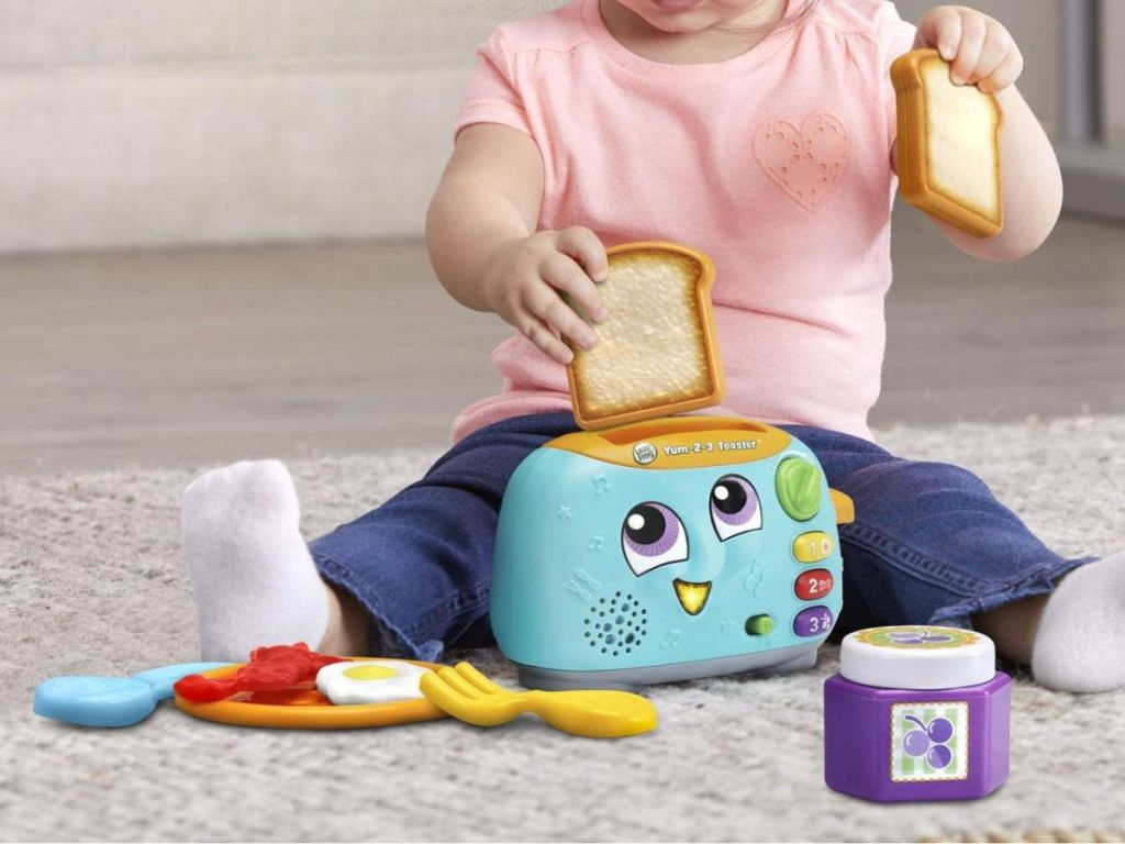 A child playing LeapFrog Toaster