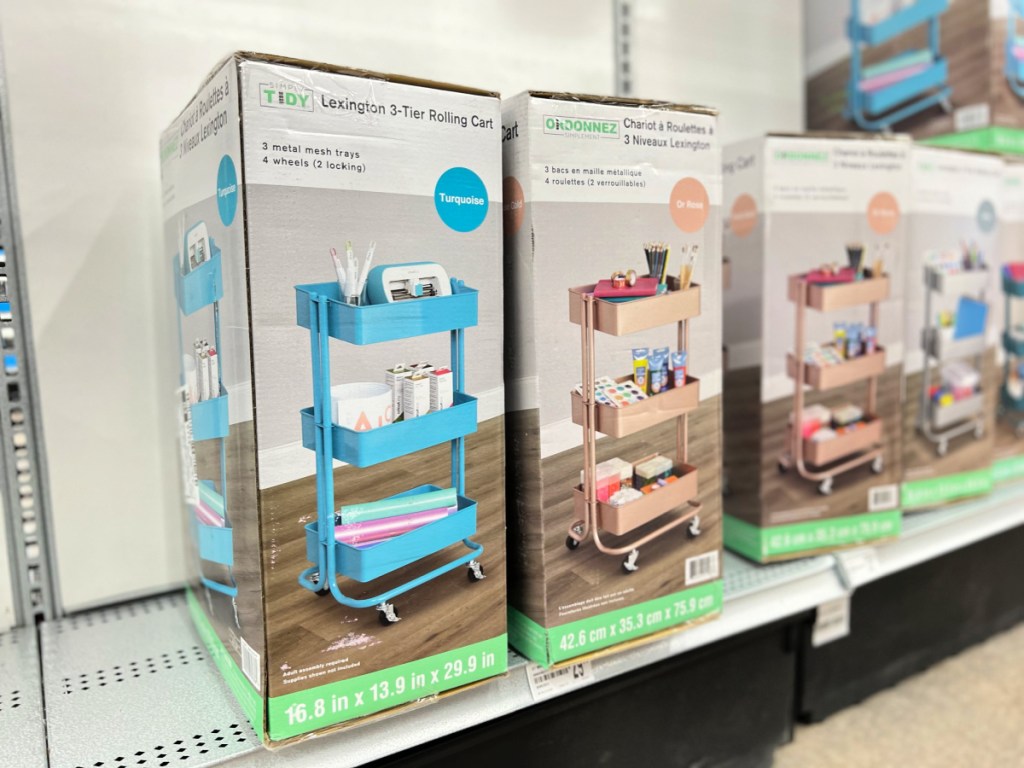 Michaels store shelf featuring different colored three tiered, rolling carts