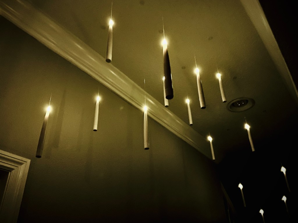 Magic Deco Floating Electric LED Candles displayed in ceiling with the lights off