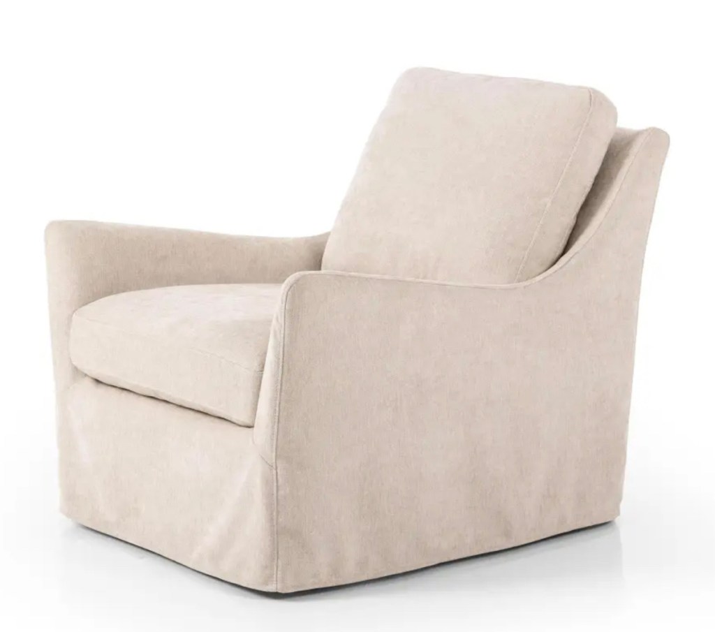 stock photo of cream slip covered chair