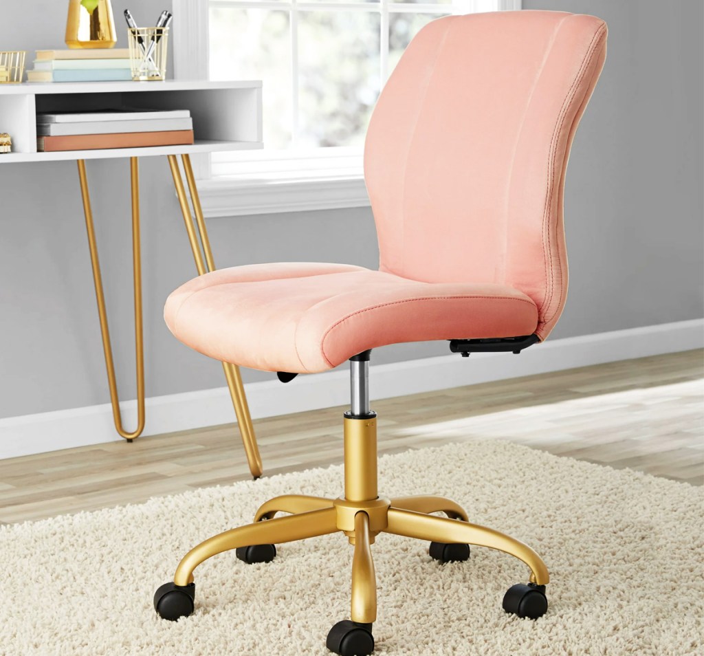 light pink and gold armless rolling office chair