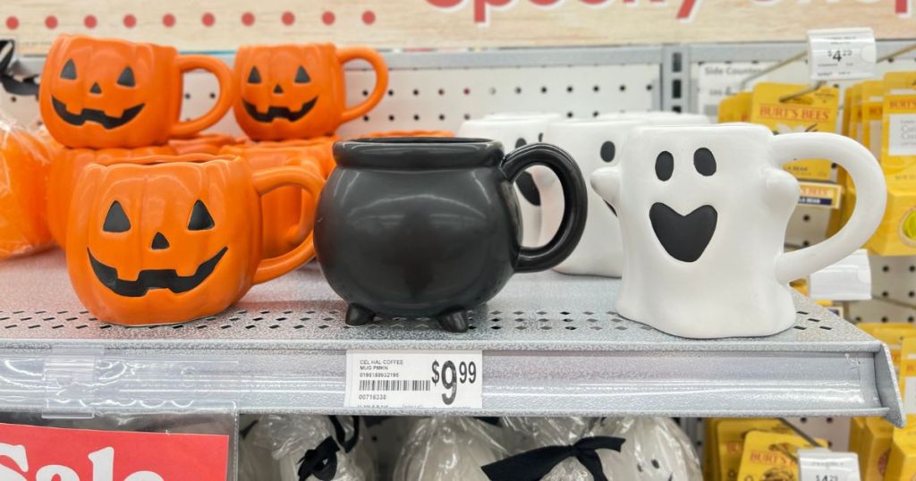 Michael's Halloween Mugs on a shelf 