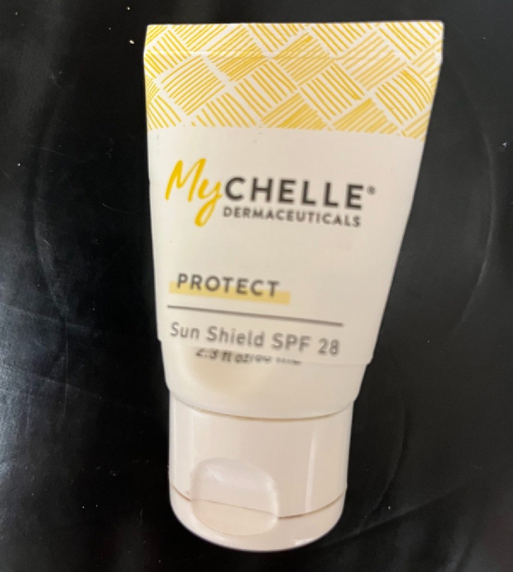 A bottle of My Chelle sunscreen that a Happy Friday reader cut in half and reassembled in order to get all the product out of the container