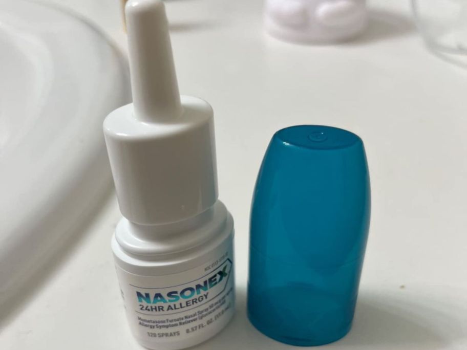A bottle of Nasonex on a bathroom counter