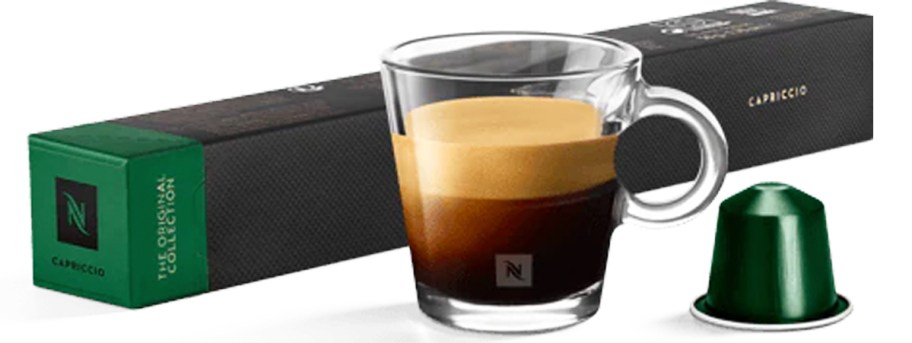 cup of coffee with nespresso pod and box of pods behind it