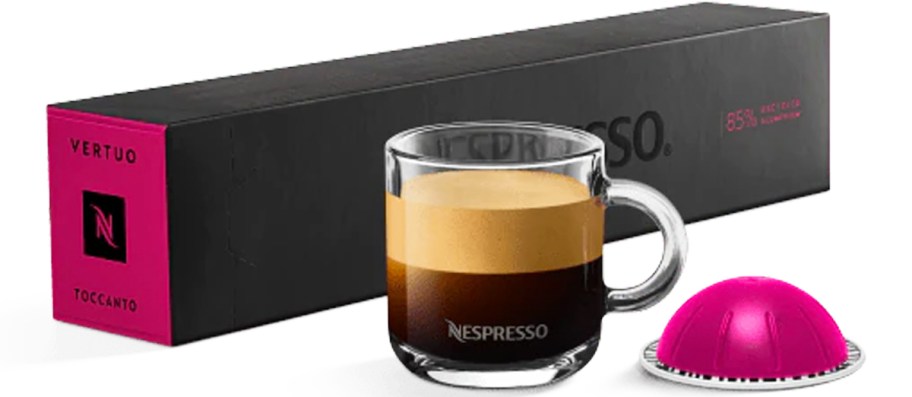 cup of coffee with nespresso pod and box of pods behind it