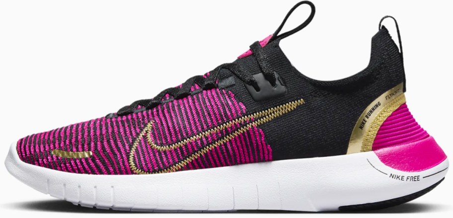 pink and black nike running shoe