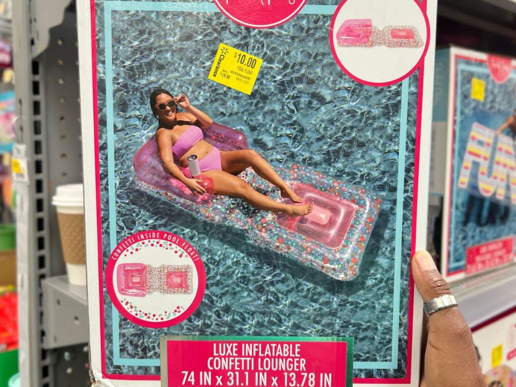 A picture on a box of a woman on a Packed Party Inflatable Lounger 