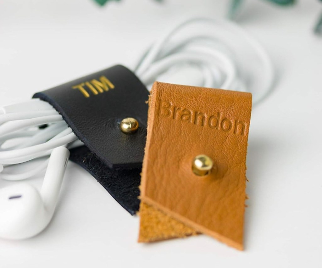 camel brown and black Personalized Leather Cable Holder on white cord headphones