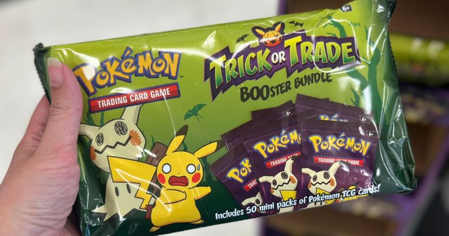 holding halloween pokemon booster bundle