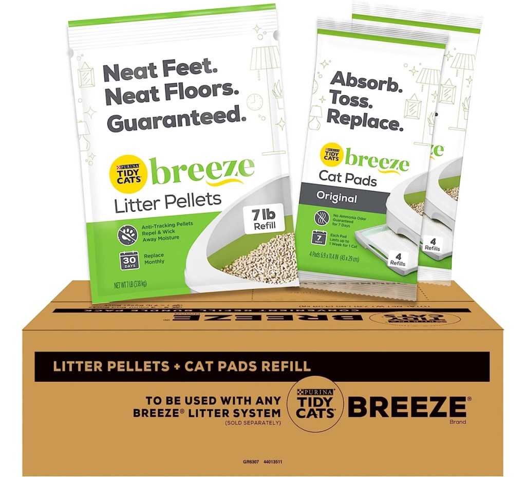 tidy cat breeze liter pellets and cat pads on top of shipping box