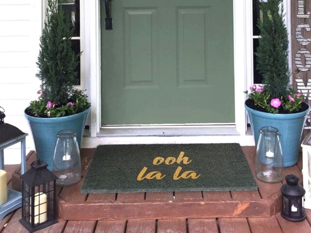 black doormat that says ooh laa laa