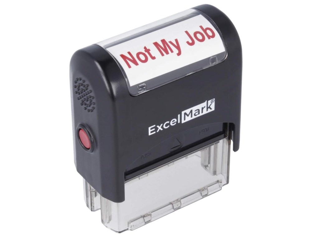 stock photo of self stamper with red not my job letters