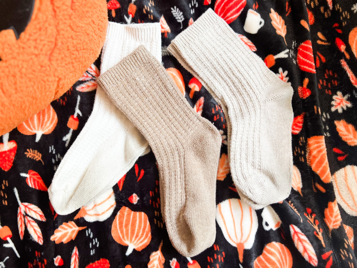 Target waffle knit socks on pumpkin throw blanket 