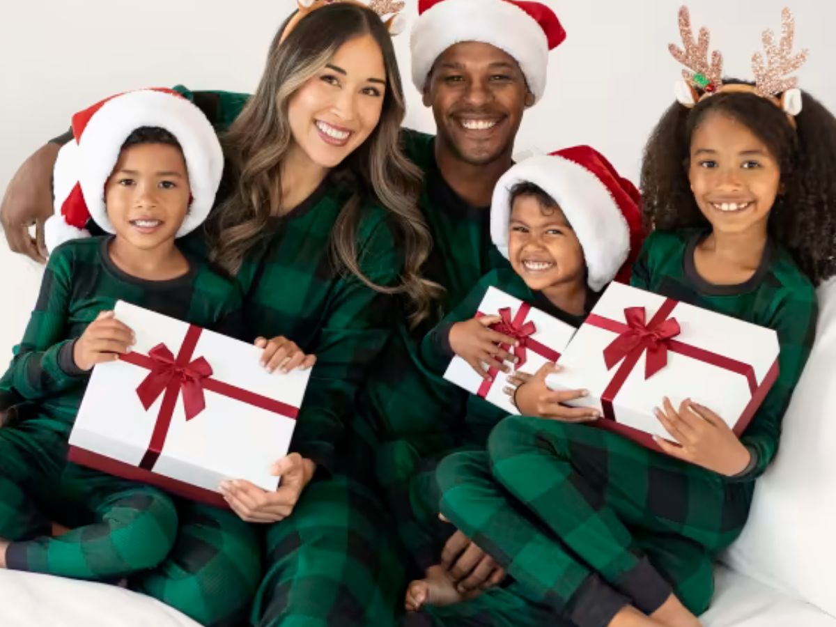family wearing matching christmas pajamas