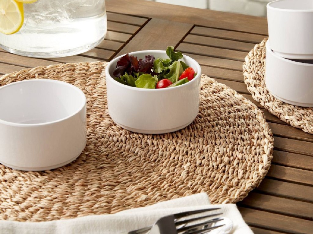  Threshold-wisted-Seagrass-Woven-Charger-2-Pack-with-plates-and-food-on-it